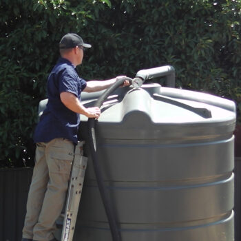 Dave cleaning a poly tank1182 Dave cleaning a poly tank1182